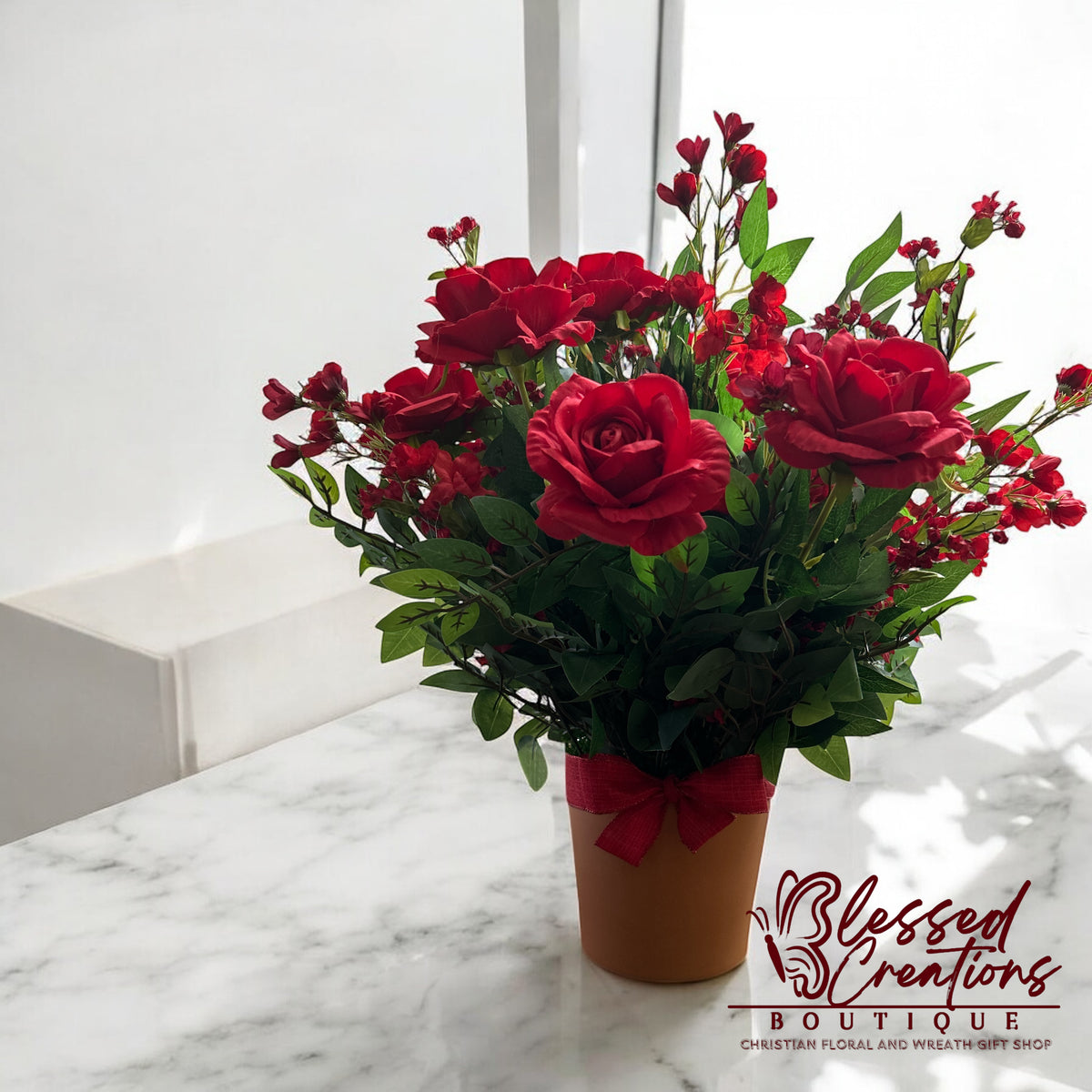 Red silk floral arrangement