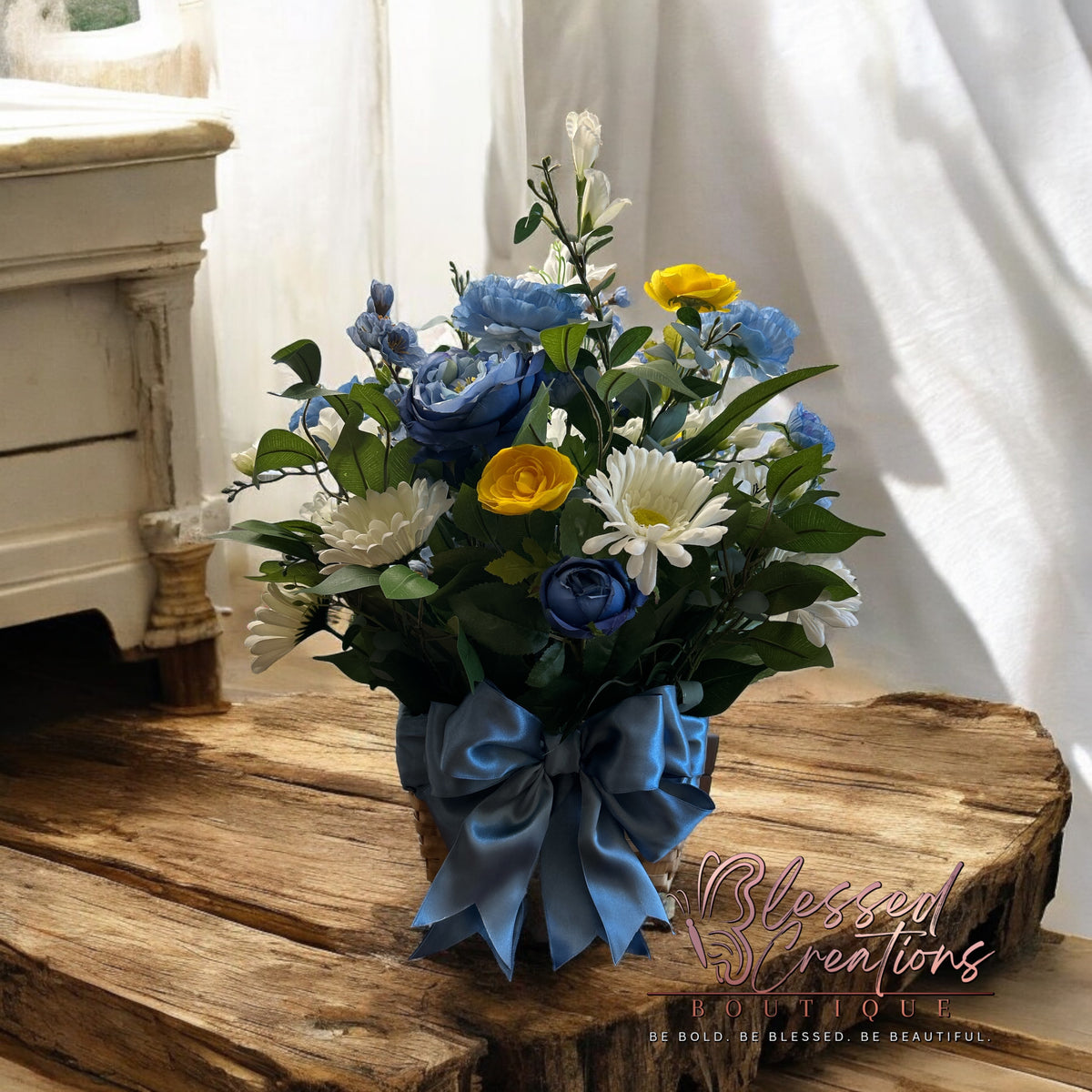 Light blue/yellow silk floral arrangement